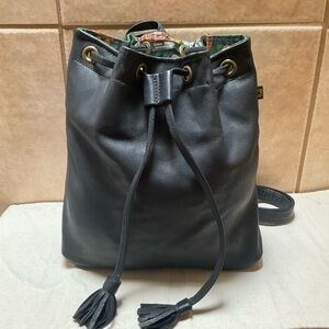 Deux Mains Black Leather Drawstring Backpack small bag rubber bottom